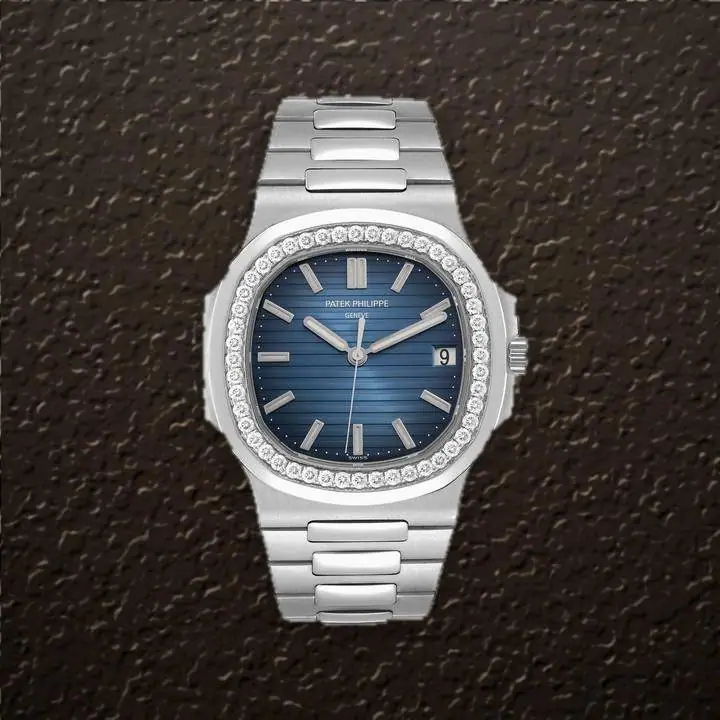 Patek Philippe Nautilus (Blue embossed Dial), reference 5713/1G-010, at Yousef Watch